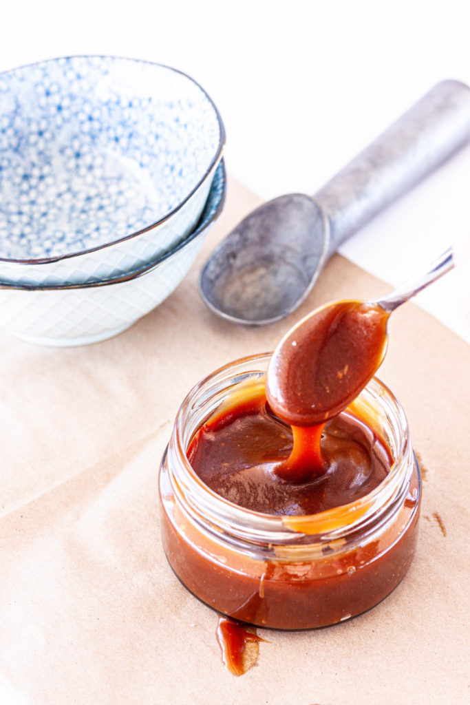 A jar of homemade caramel sauce